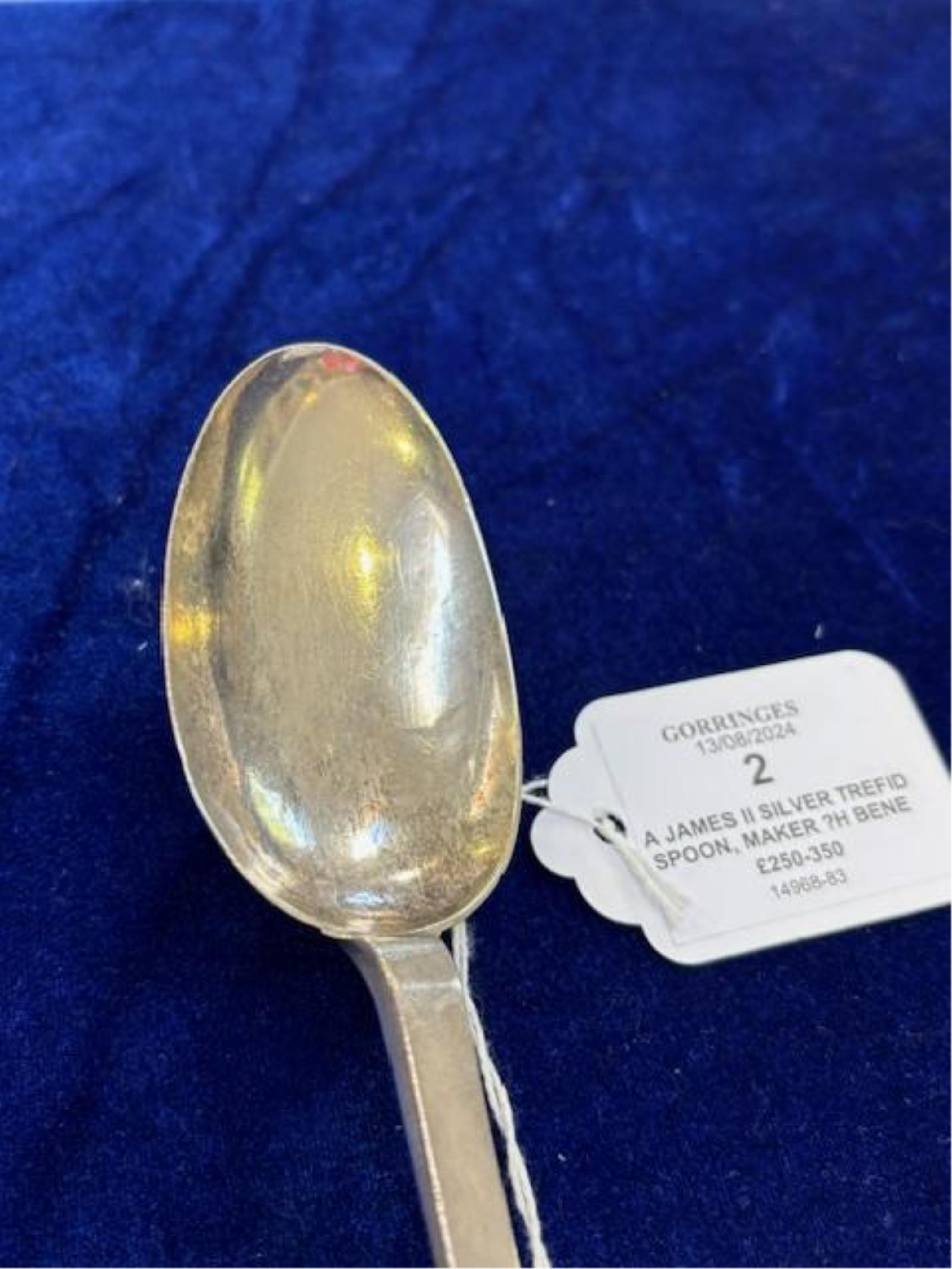 A James II silver trefid spoon, maker ?H beneath a crown